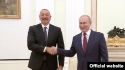 Azərbaycan və Rusiya prezidentləri İlham Əliyev (sol) və Vladimir Putin, Moskva , 20 iyul 2021