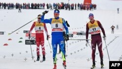 Қазақстандық шаңғышы Алексей Полторанин (6) Италиядағы Tour de Ski жарысында. 6 қаңтар 2018 жыл. 