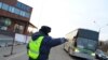 Russia -- Traffic patrol officer stops a bus on Don Motorway, 02Apr2010