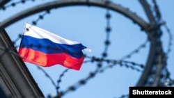 UKRAINE – Flag and barbed wire on the building of the Embassy of Russian Federation in Kyiv, September 18, 2016