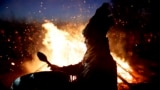 RUSSIA -- A shaman hammers his drum during Lunar New Year celebrations in Russian Republic of Tyva, February 12, 2021