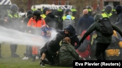 Amsterdamda polislə toqquşmalar